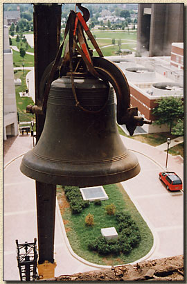 Crane lowering church bell